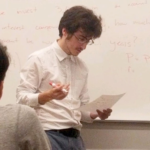 picture of me teaching at the whiteboard